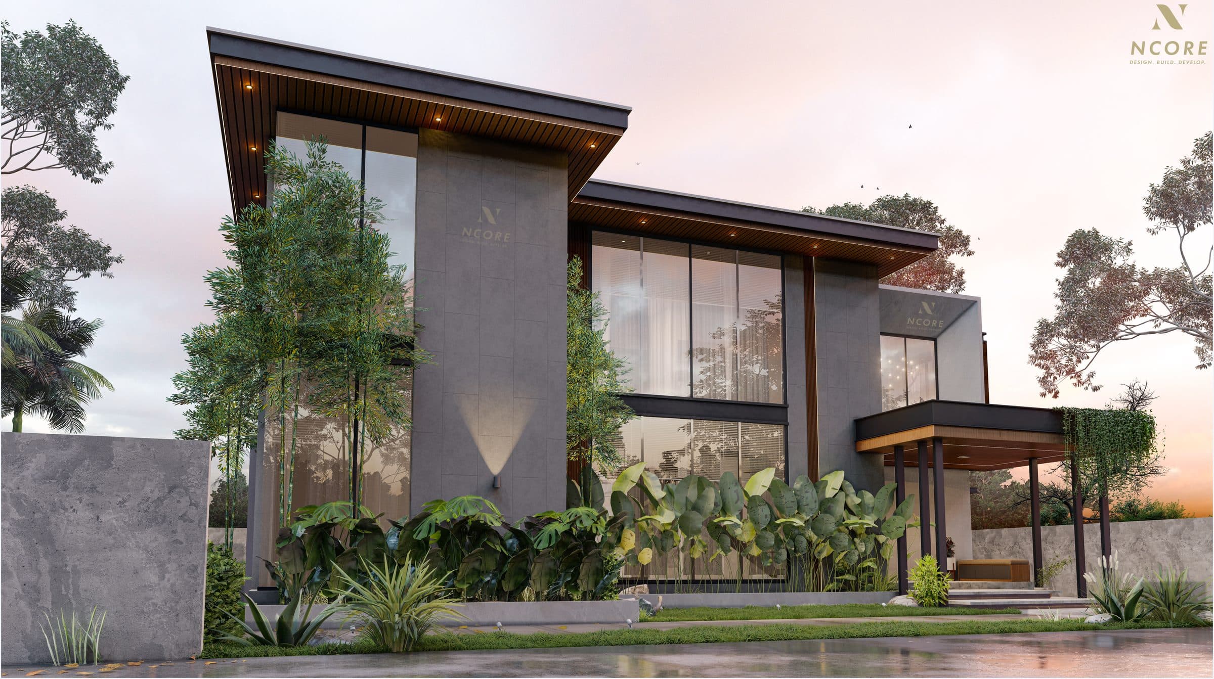 The same house from an angle at dusk, the cantilevered upper floor and the entrance canopy lit from within