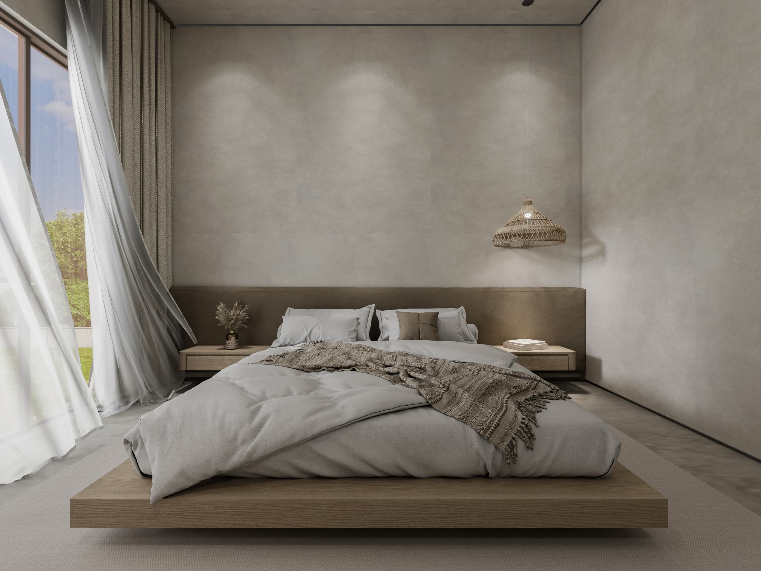 Bedroom with a floating oak platform bed and a full-width upholstered headboard, lit by a woven rattan pendant